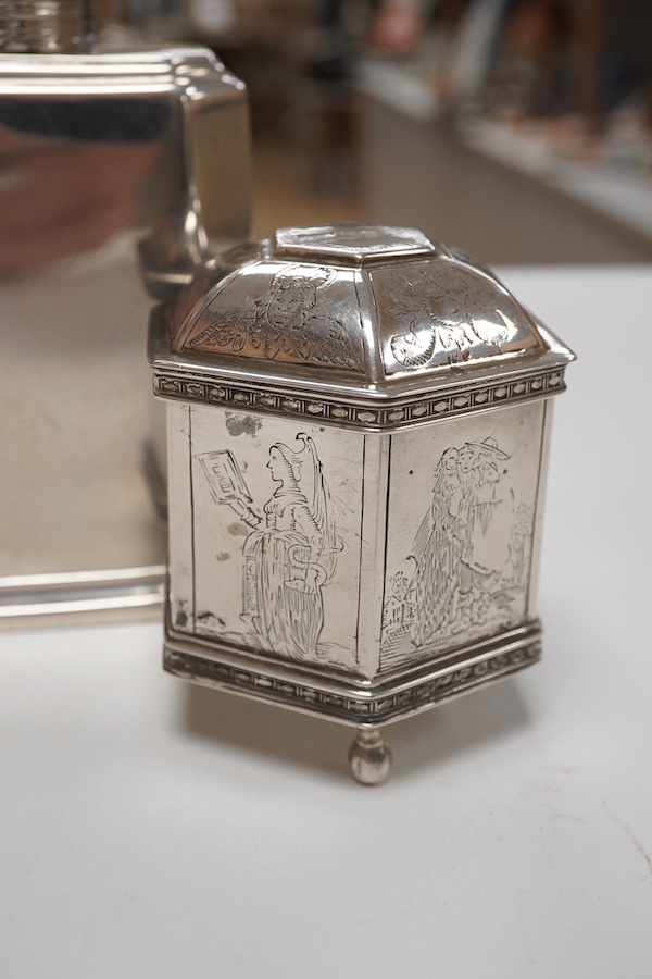 A late Victorian silver octagonal tea caddy, by Thomas Bradbury & Sons, London, 1895, 12.8cm and a Dutch? engraved white metal hexagonal silver marriage pot and cover, 8.3oz. Condition - poor to fair